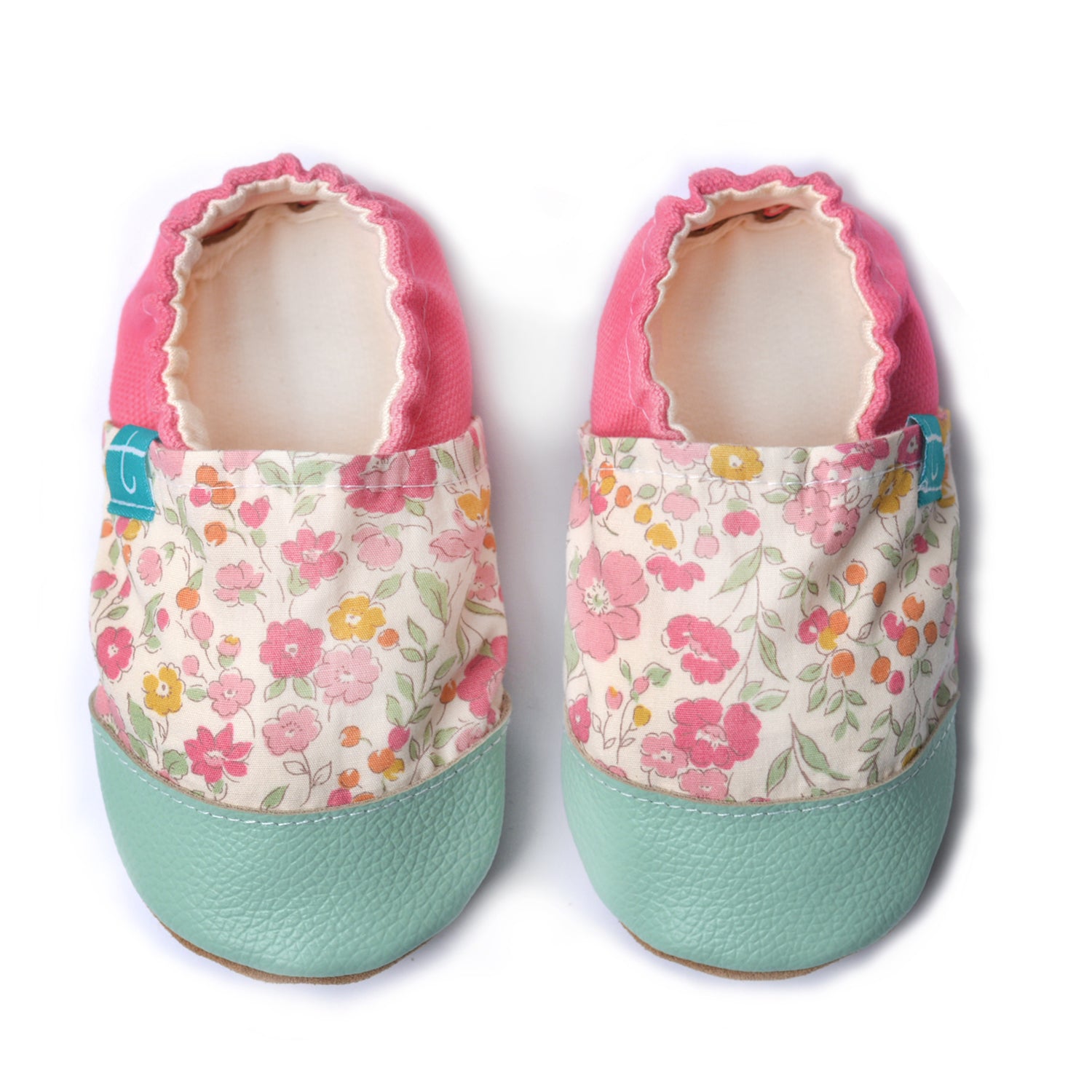 Pantoufles roses à marguerites pour enfant