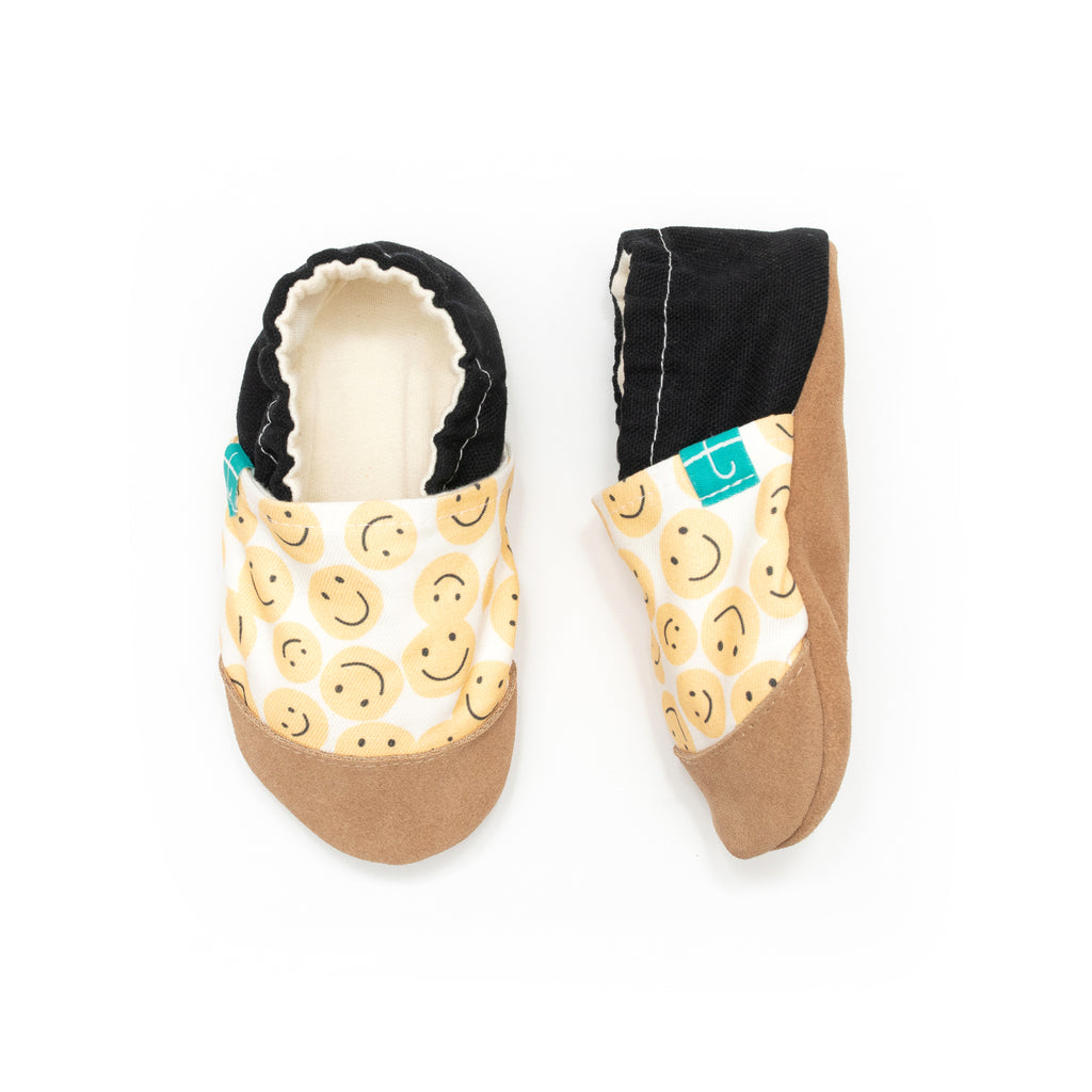 Pantoufles enfant jaunes souriantes